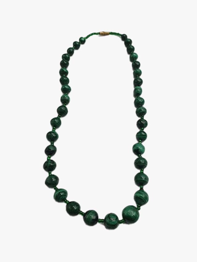 Image may contain: Accessories, Bead, Bead Necklace, Jewelry, Ornament, Necklace, Gemstone, and Jade