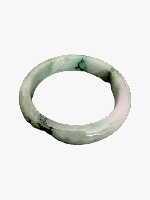 Image may contain: Accessories, Jewelry, Gemstone, Jade, Ornament, Plate, and Ring