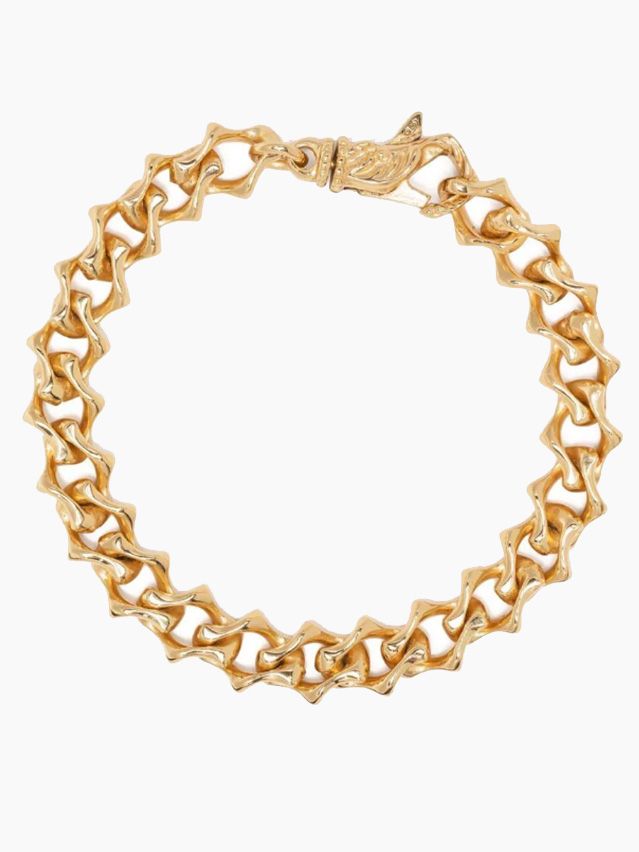 Image may contain: Accessories, Bracelet, Jewelry, Gold, and Necklace