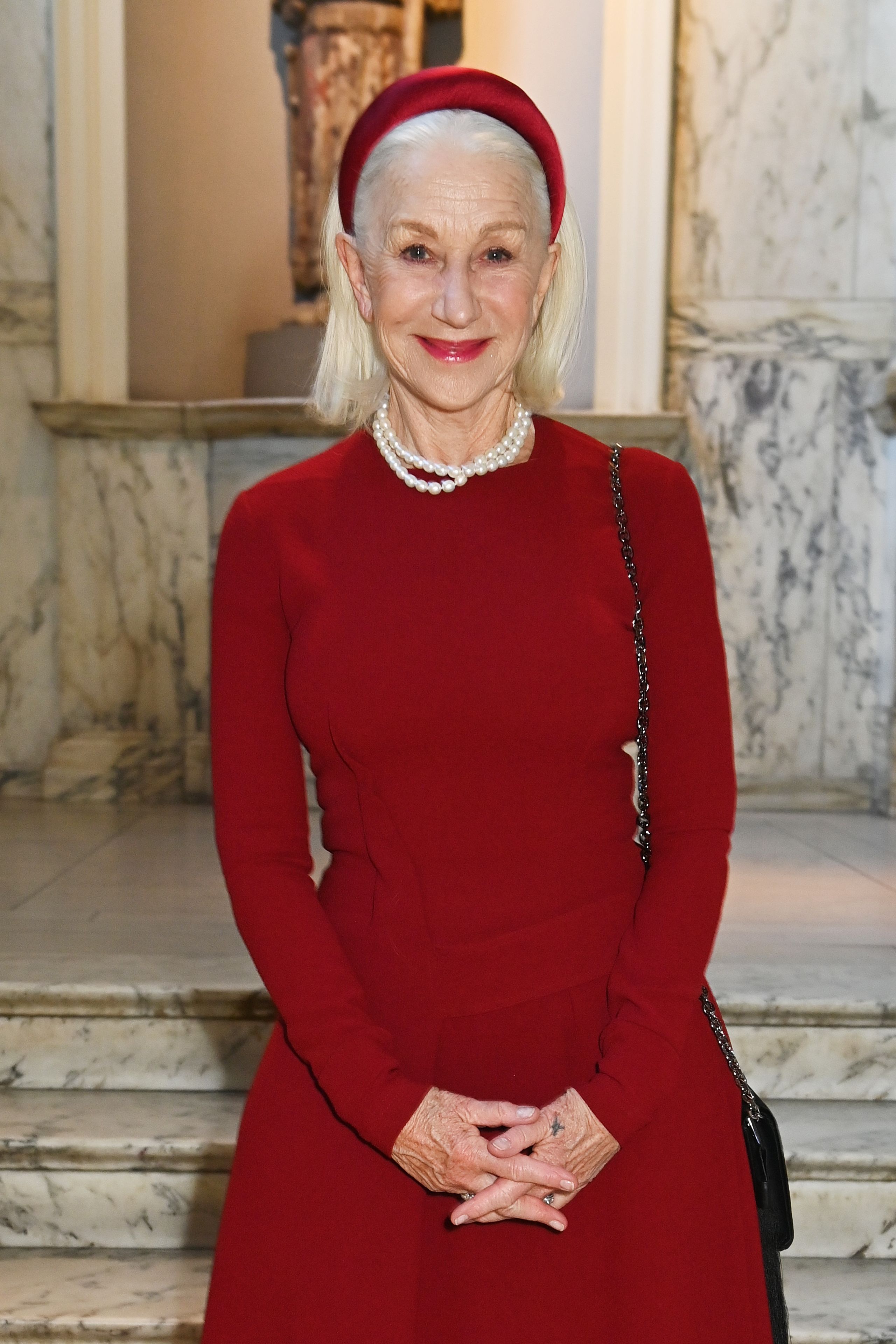 Image may contain Helen Mirren Person Adult Accessories Jewelry Necklace Bag Handbag Clothing and Hat