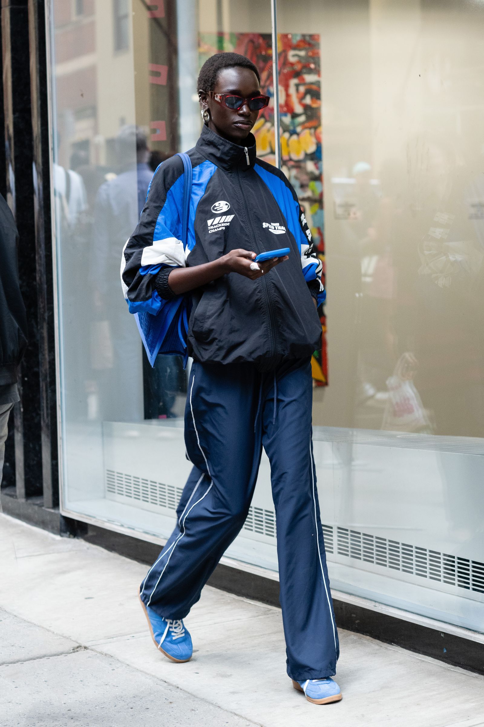 Image may contain Herieth Paul Clothing Footwear Shoe Person Standing Adult Accessories Glasses and Electronics