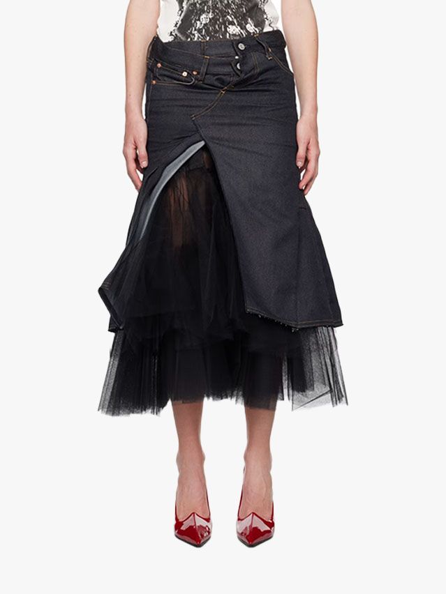 Image may contain Clothing Skirt Adult Person Miniskirt Footwear High Heel Shoe and Pants