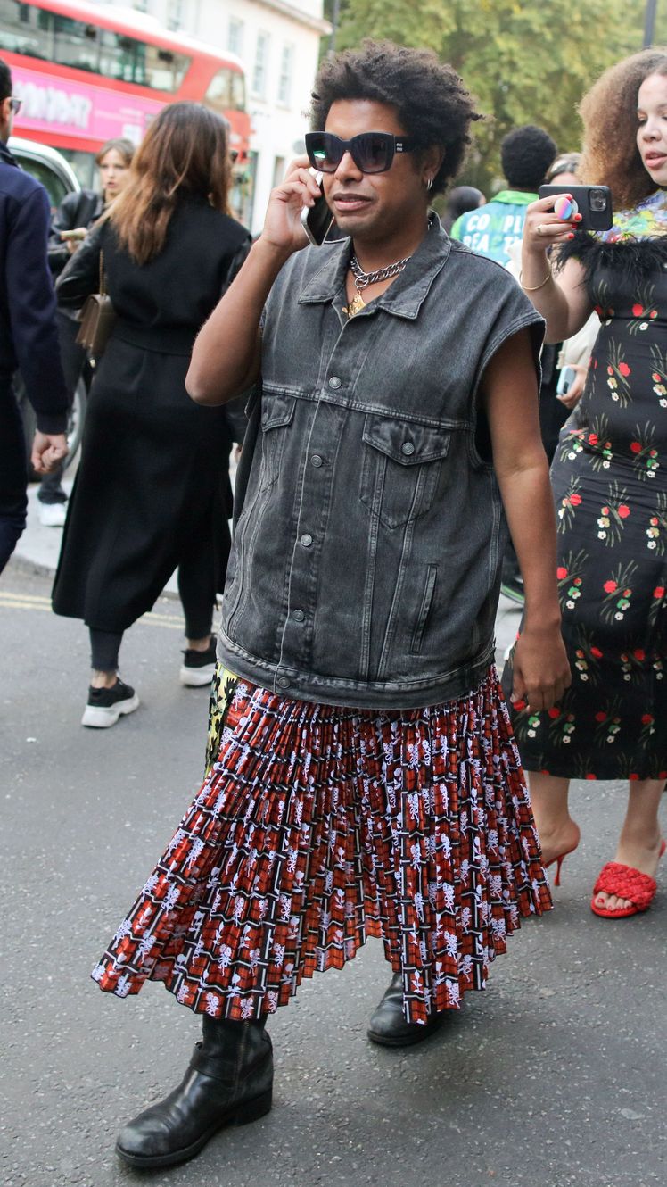 Image may contain Linda Pritchard Clothing Skirt Footwear Shoe Accessories Glasses Adult Person Bag and Handbag
