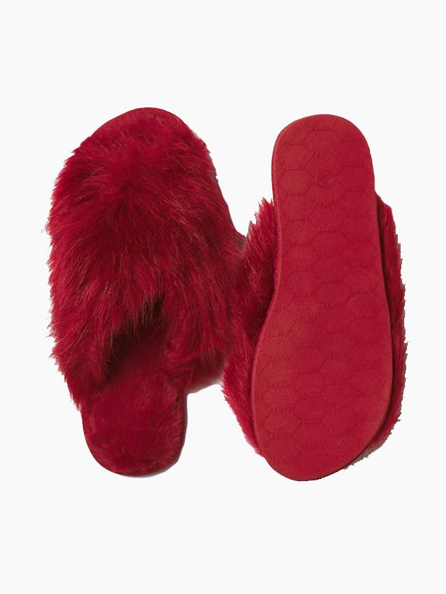 Image may contain Clothing Footwear Shoe Glove Cushion Home Decor and High Heel