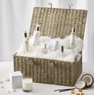 Image may contain Fun Bottle Cosmetics Perfume Leisure Activities Picnic and Picnic Basket