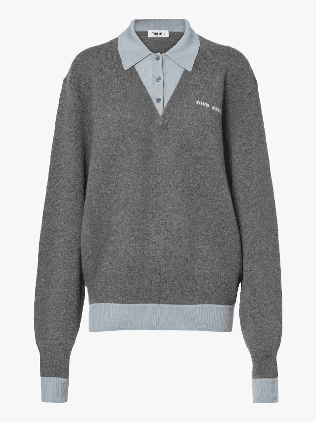 Image may contain Clothing Knitwear Sweater Sweatshirt Fleece and Hoodie