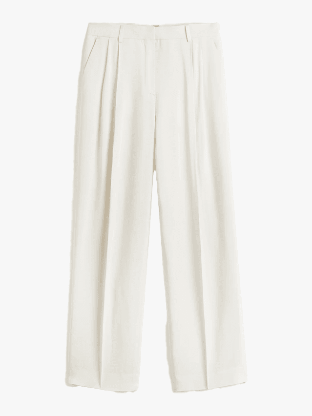 Image may contain Clothing Home Decor Linen Pants and Skirt