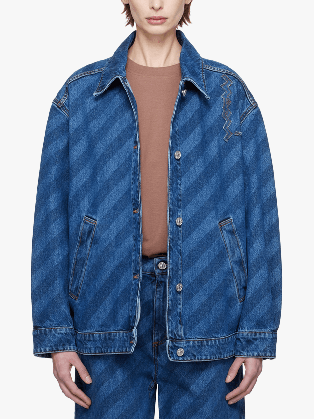 Image may contain Clothing Pants Coat Jacket Jeans and Vest