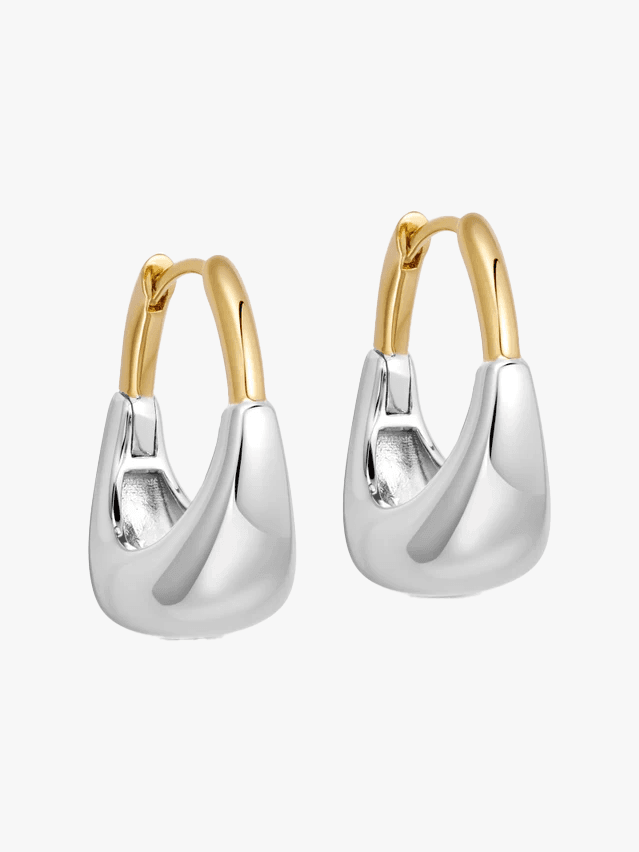 Image may contain Accessories Earring Jewelry Clothing Footwear High Heel Shoe and Silver