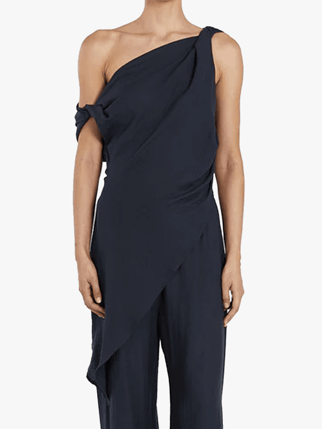 Image may contain Clothing Dress Adult Person Formal Wear Fashion Gown and Pants