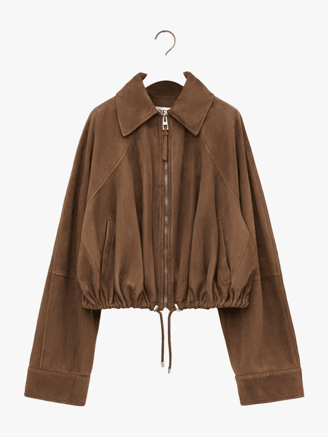 Image may contain Clothing Coat Jacket Fleece Knitwear and Sweater