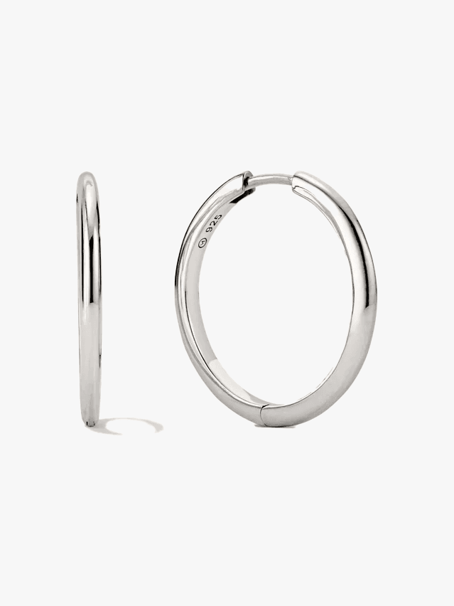 Image may contain Accessories Earring Jewelry Diamond Gemstone Platinum and Cuff