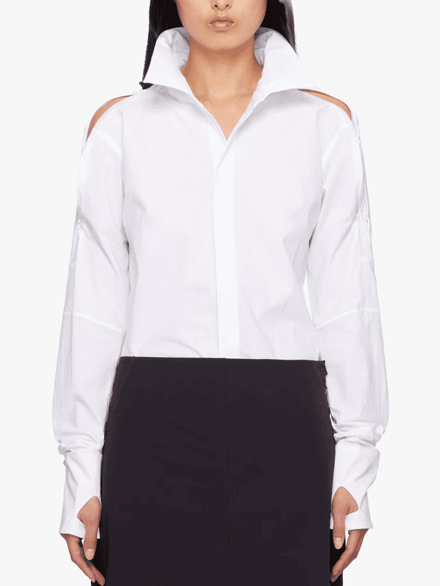Image may contain Clothing Shirt Blouse Dress Shirt Long Sleeve and Sleeve