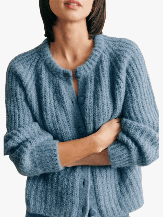 Image may contain Clothing Knitwear and Sweater