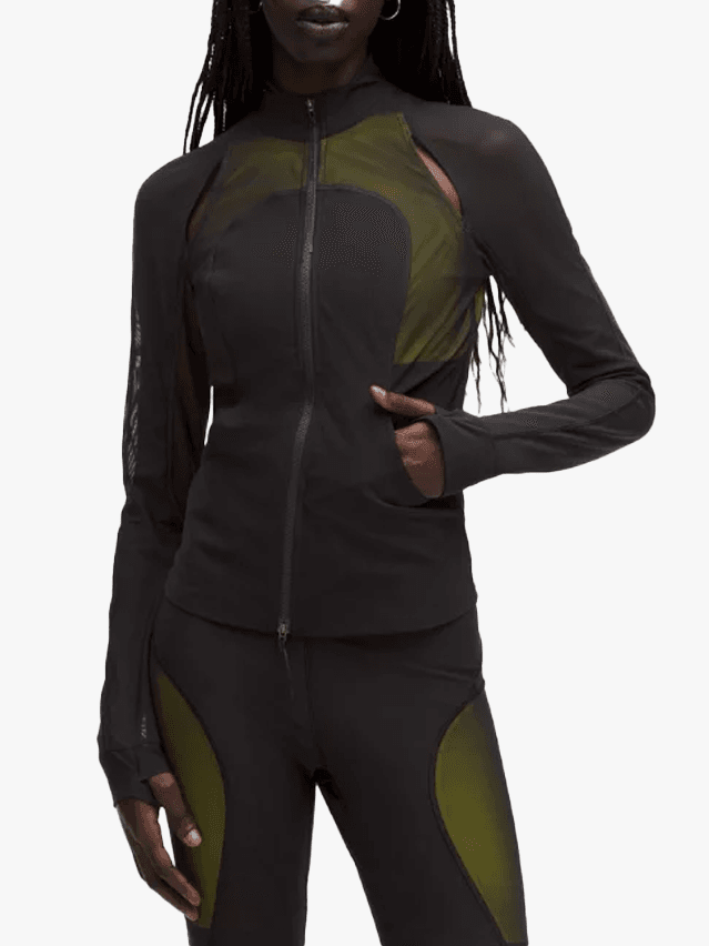 Image may contain: Clothing, Long Sleeve, Sleeve, Adult, Person, Spandex, Face, Head, Coat, and Jacket