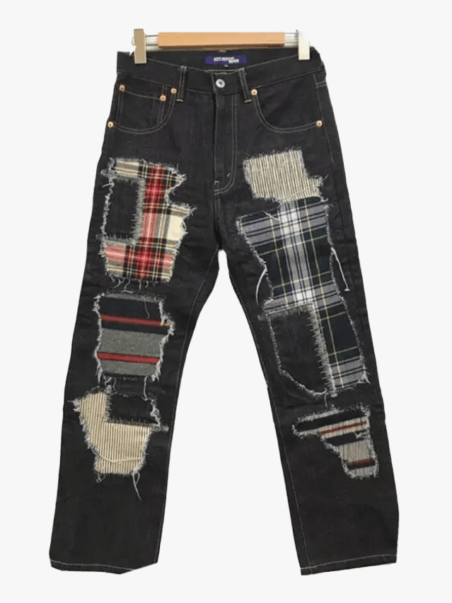 Image may contain Clothing Pants Jeans and Coat