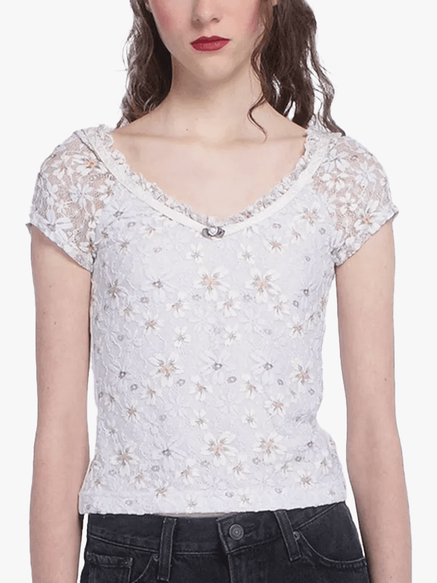 Image may contain Blouse Clothing Sleeve and TShirt
