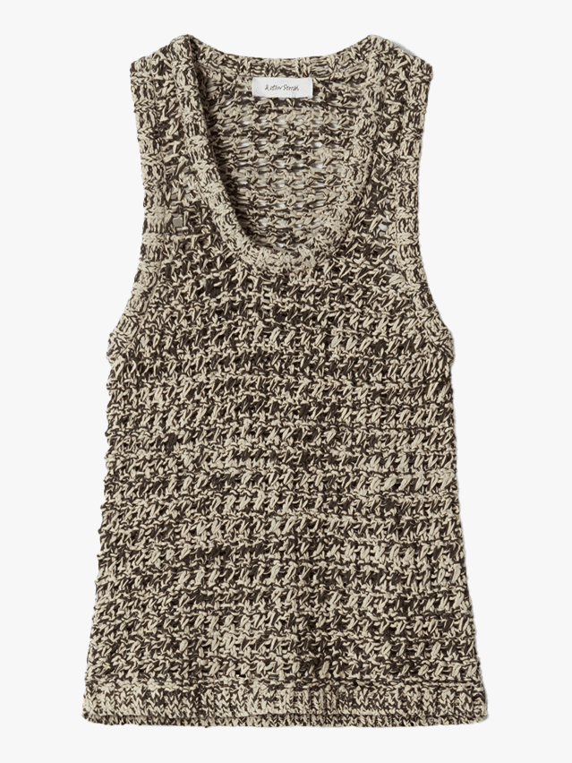 Image may contain Blouse Clothing Tank Top Home Decor and Coat