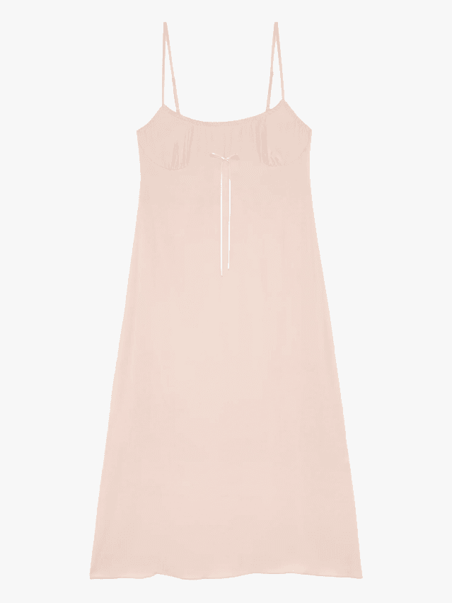 Image may contain Clothing Dress Home Decor Linen Blouse Tank Top and Coat