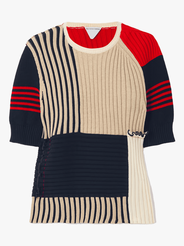 Image may contain Clothing Knitwear Sweater and Skirt