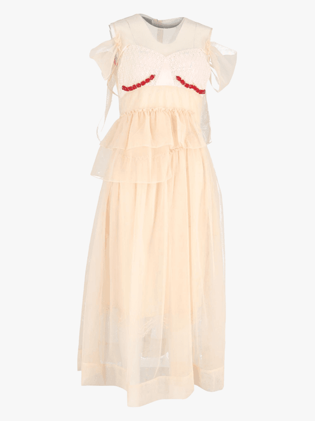 Image may contain Clothing Dress Blouse Formal Wear Fashion Gown Wedding and Wedding Gown