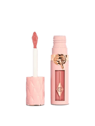 Image may contain Cosmetics Lipstick Bottle and Perfume