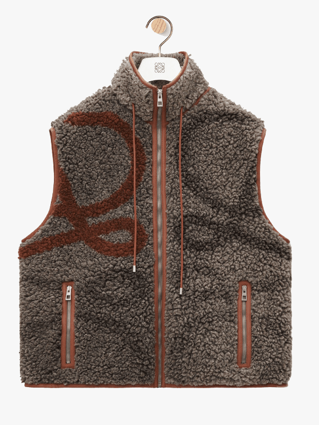 Image may contain Clothing Vest Lifejacket and Fleece